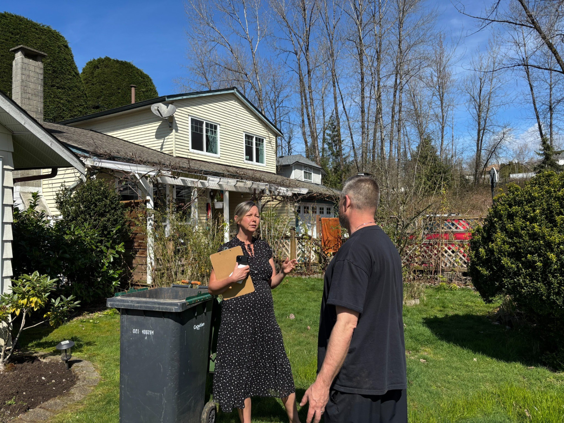 Jane speaking with a resident